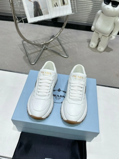 2025 Women Prada White Cow Leather Lambskin Sneakers KFY00310