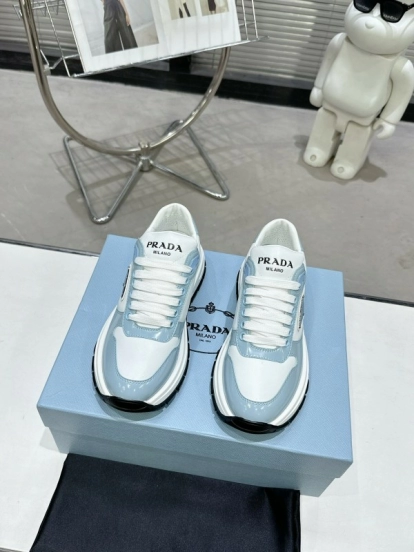 2025 Women Prada Light Blue White Leather Sneakers KFY00310